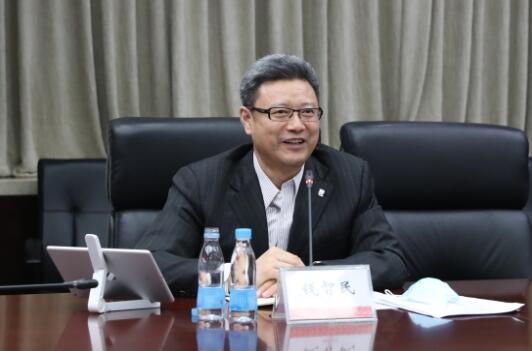 錢智民拜訪中國建材黨委書記、董事長周育先