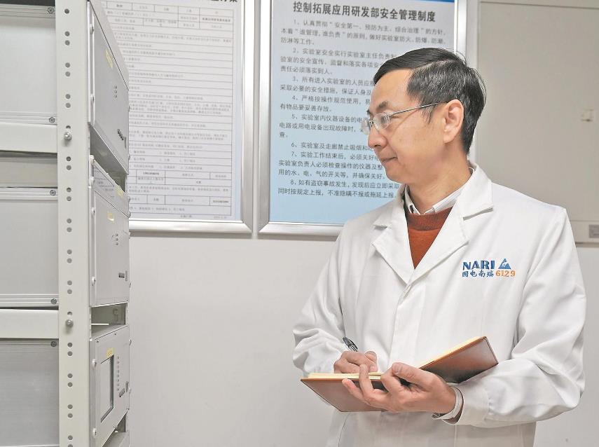 【國網(wǎng)特等勞?！坷钔簽榇箅娋W(wǎng)安全穩(wěn)定運行添“利器”